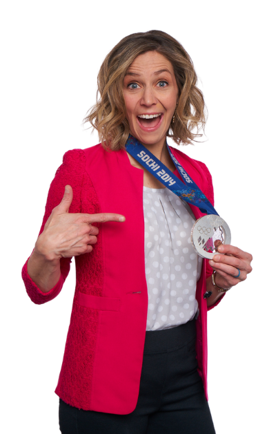 Noelle holding her olympic medal with pink jacket